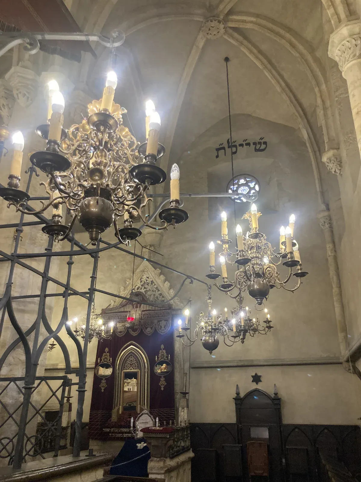 Gothic vault and chandeliers inside the Old-New Synagogue, a stop on Prague Jewish Quarter tours